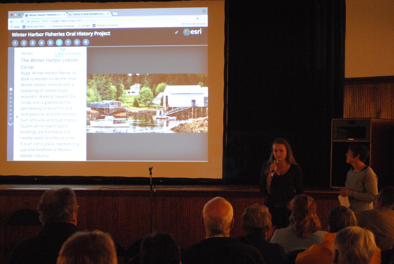 people giving a presentation in front of a projection screen